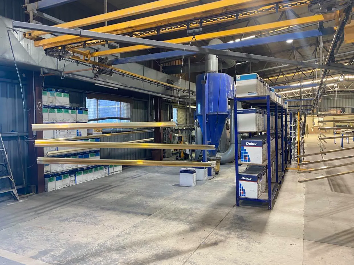 The overhead coating line inside the OZ Coat workshop at Elizabeth South